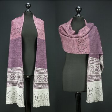 Rectangular purple knit shawl on dress form, gradient body with white geometric bands and lace-edged ends