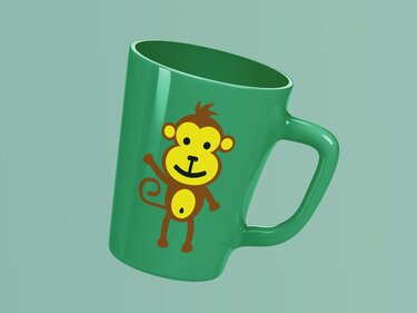 Grüne Tasse mit stilisiertem, flächigem Affenmotiv