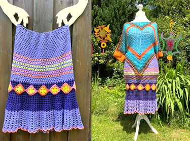 Gehäkeltes Damen‑Set mit knielangem Rock und ponchoähnlichem Oberteil in Violett, Türkis, Orange und Gelb, auf einer Schaufensterpuppe im Garten.