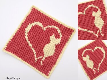 Gehäkeltes rotes Quadrat mit cremefarbener Katzen-Silhouette in Herzform