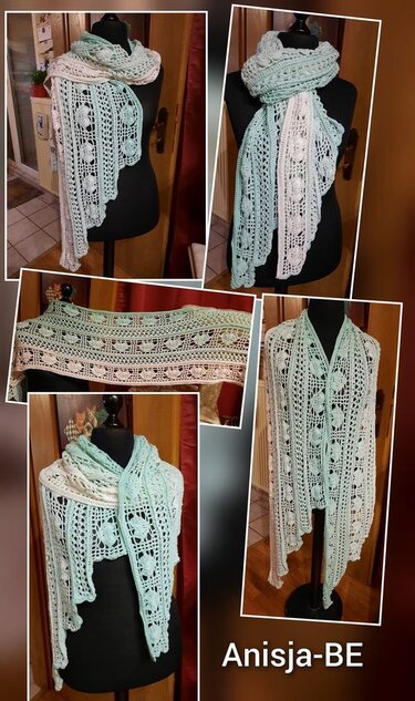 Long mint and cream crochet scarf with lace panels and scalloped edge displayed on a black dress form