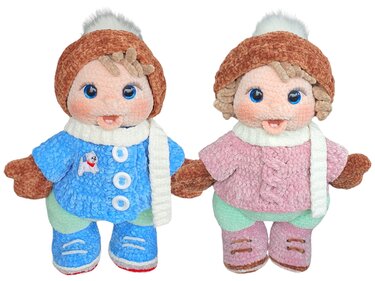 Two crocheted amigurumi dolls side by side wearing brown pom‑pom hats, white scarves, mittens and buttoned coats—one blue, one pink.