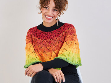 KURZPONCHO FLAMME - Stricken