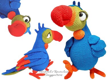 Bright blue crocheted parrot amigurumi with red beak, green face and orange feet