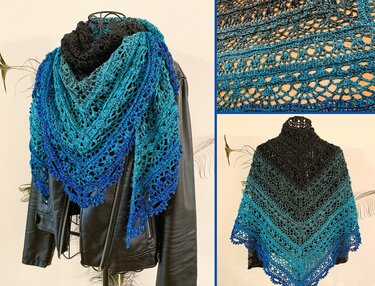 Black-to-blue gradient triangular crochet shawl draped over a black jacket on a mannequin