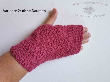 Nahaufnahme eines pinken gehäkelten fingerlosen Armstulpens ohne Daumenloch