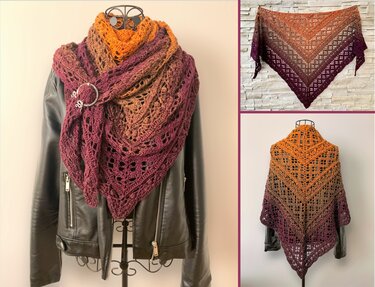 Ombre crocheted triangle shawl in orange-to-plum with openwork lace, draped over a black leather jacket and shown flat.