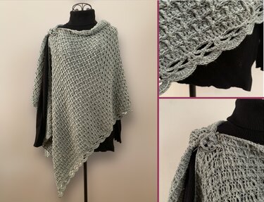 Light grey crocheted poncho with textured stitch and scalloped edge displayed on a mannequin wearing a black turtleneck.