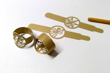 Goldene Plottdateien für Serviettenringe mit Engel- und Schneeflockenmotiven