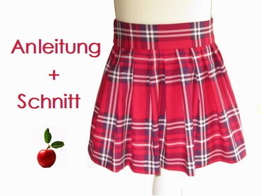 Roter karierter Kinder-Faltenrock mit Taillenbund auf Schneiderpuppe, Text 'Anleitung + Schnitt' links