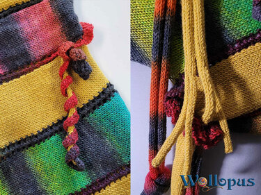 Gestrickter Loop mit bunten Streifen, gedrehten Kordeln und Quasten