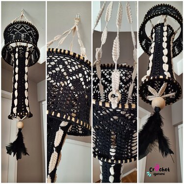 Gehäkelter Deckenhänger in Schwarz und Creme mit Holzringen und schwarzer Federquaste