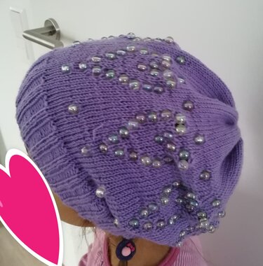 Strickanleitung einer Kindermütze mit Perlen