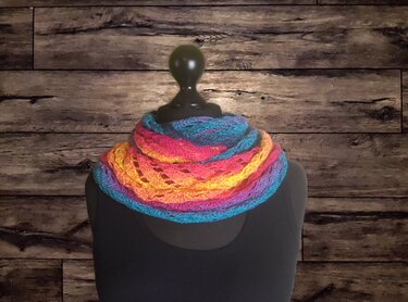 Openwork crochet loop scarf wrapped twice on mannequin