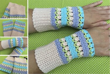 Nahaufnahme gehäkelter Armstulpen in Pastellfarben mit Streifen-, Loch- und Noppenmuster, auf Handgelenken getragen.