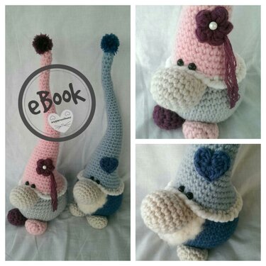 Two crocheted gnome doorstoppers in pink and blue with tall hats and pom-poms
