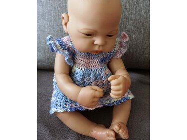 Crochet pattern for an enchanting Doll Dress