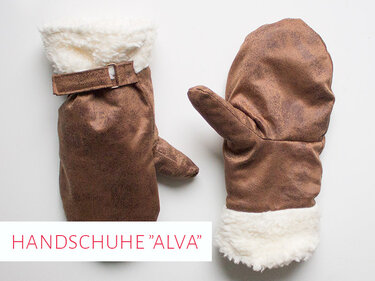 Nahaufnahme braune Fäustlinge mit Nähten, Riemen und Kunstfellbündchen