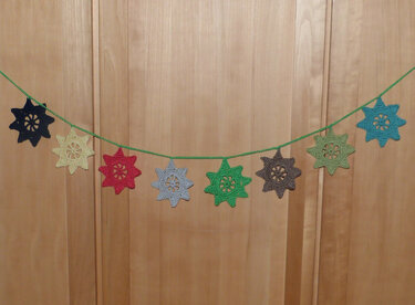 H&auml;kelanleitung f&uuml;r eine vielseitige, dekorative Sternengirlande - Häkeln