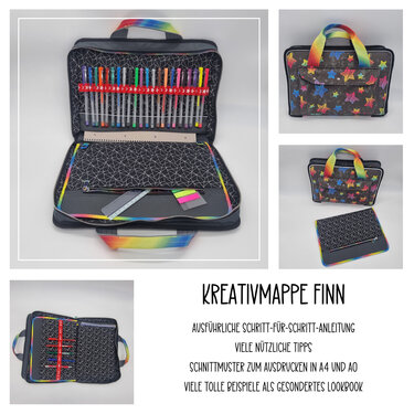 Offene graue Kreativmappe ‚Finn‘ mit regenbogenfarbenem Griff, zeigt Stifte, Notizblock und Innenfächer