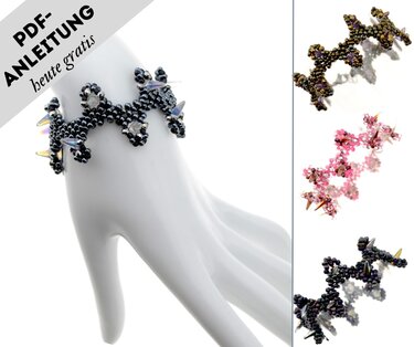 Nahaufnahme eines gefädelten Armbands mit Zackenstruktur und spikeförmigen Perlen