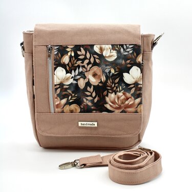 Roséfarbene Canvas-Umhängetasche mit dunklem Blumen-Frontpanel, Reißverschlussfach und abnehmbarem Schultergurt