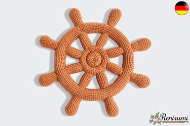 Gehäkeltes Steuerrad aus orangefarbenem Garn mit acht Speichen
