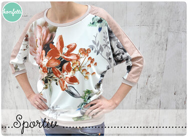 Locker geschnittenes Damenshirt mit großem Blumenprint und perforierten rosa Raglanärmeln