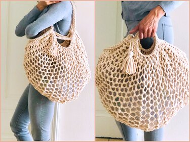 Woman holding a large beige open-knit tote bag with a tassel.