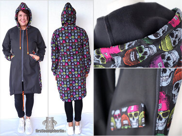 Knielange schwarze Damen-Kapuzenjacke mit buntem Totenkopf-Innenfutter, Front- und Rückansicht sowie Detailaufnahmen