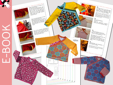 Bunte Baby-Wickelshirts und ausgedruckte E‑Book-Seiten mit Schrittfotos und Schnittbögen