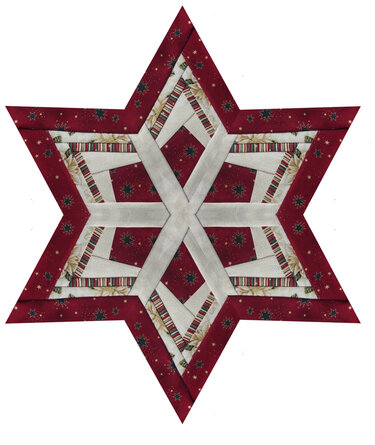 Gesteppter sechsstrahliger Stern in Rot und Creme mit Weihnachtsmotiven