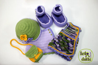 Crochet doll outfit set: green hat with yellow flower, lavender shoes, lavender top, multicolored vest, and small purse on white background