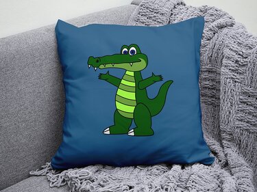 Kissen mit kontrastreichem grünen Krokodil-Plottdesign