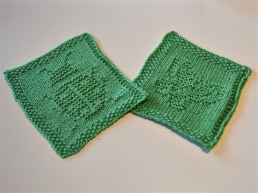 Two green knitted square swatches with different tree motifs on a white background.