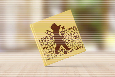 Braune Silhouette eines Schornsteinfegers mit Zylinderhut und Leiter, umgeben von Wörtern wie LOVE, JOY, HOPE, HAPPINESS, MAGIC, COURAGE, ADVENTURE auf hellem Grund.