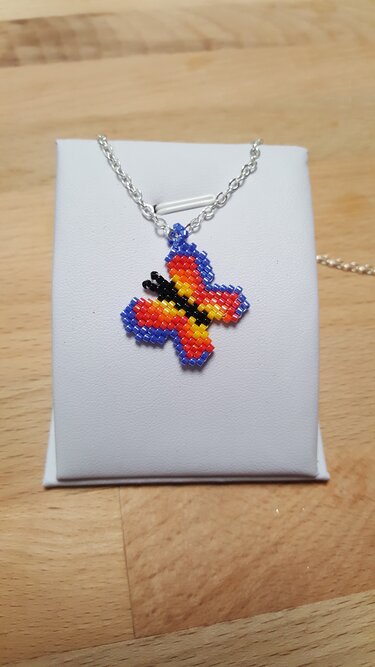 kleiner bunter Schmetterling / Anhänger / Ohrring aus Perlen - Basteln