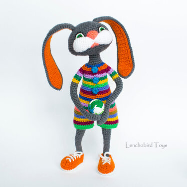 Amigurumi pattern for the Easter bunny. Colorful crochet sporty rabbit