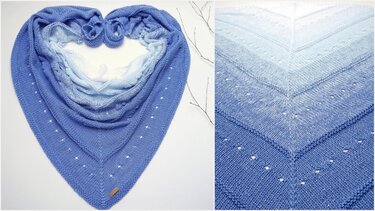Knitted triangle shawl in blue-to-light-blue gradient with eyelet rows, arranged on a white background.
