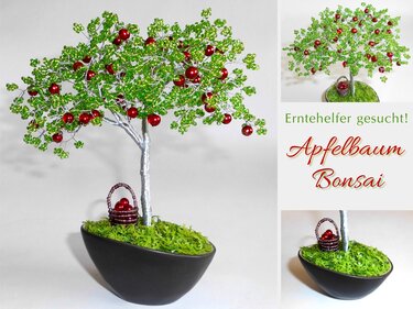 Bastelidee: Apfelbaum-Bonsai aus Draht, grünen Rocailles und roten Perlen im kleinen schwarzen Topf