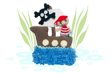 Gehäkeltes Amigurumi Piratenschiff mit Piratenfigur und Totenkopfsegel