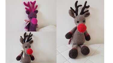 Drei gehäkelte Amigurumi-Rentiere in Lila und Braun mit bunten Nasen und Geweih