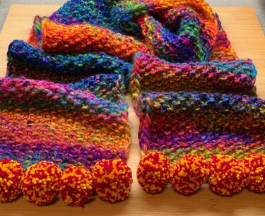 Helmis Bommelschal "Mille Colori" - Stricken