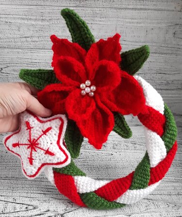 Year round wreath with Poinsettia ornament and crochet Stars
