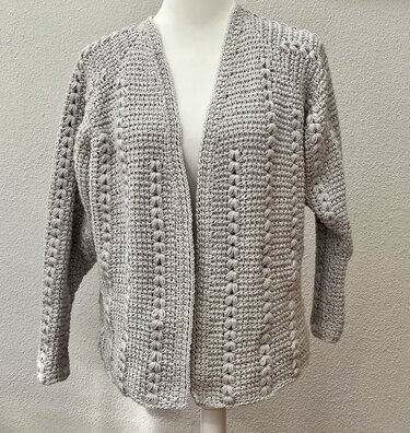 Kurze Jacke mit Zöpfchen - Bild 7