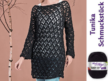 Schwarze gehäkelte Ajour-Tunika mit langen Ärmeln über weißem Top und Jeans