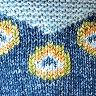 Kinderponcho Pfau der mitwächst! - Strickanleitung Größe 122/128