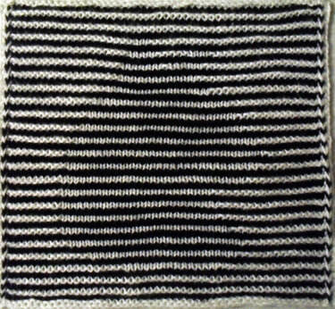 Katzenkopf als Spüli in Schattenstricktechnik mit dem besonderen Rand - Stricken