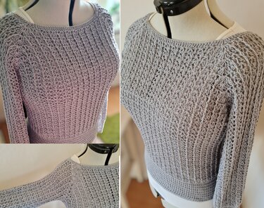 Gehäkelter grauer Damenpullover mit Lochmuster und langen Ärmeln auf Schneiderpuppe