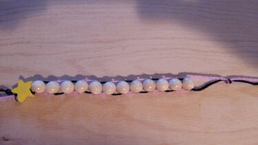 Glückskette , mit beweglichen - fixierten Holzkugeln  - Basteln